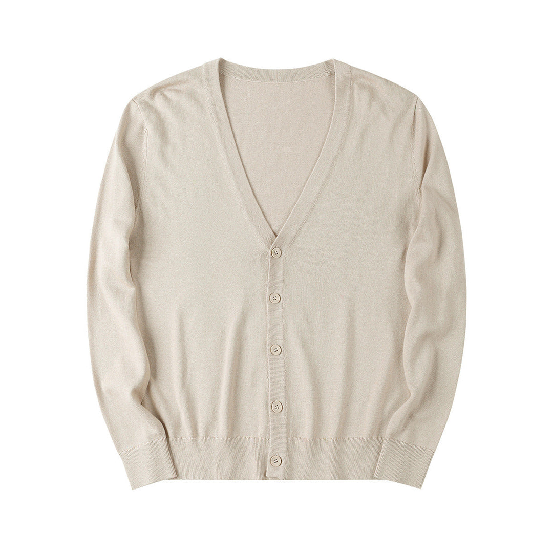 Cardigan beige in cashmere, design classico con scollo a V e bottoni, ideale per moda autunnale e invernale, abbigliamento elegante e casual.